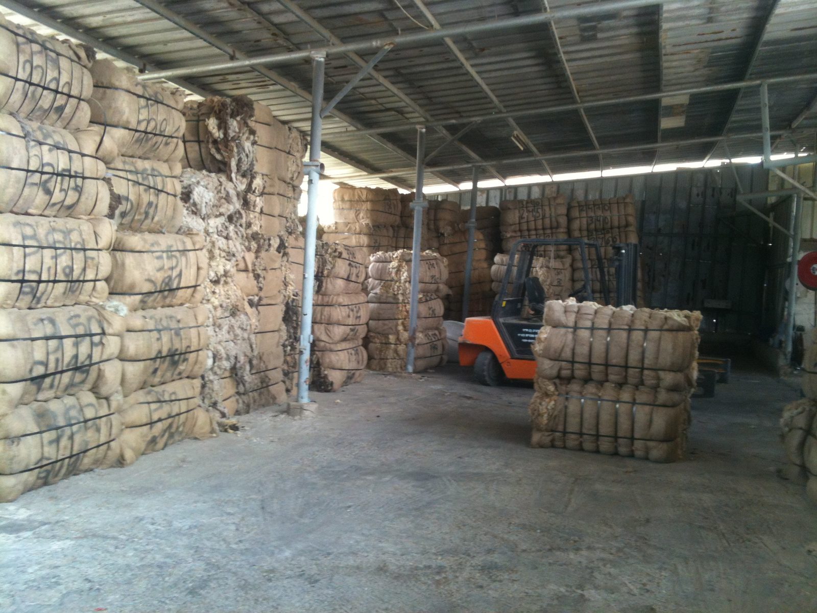 Wool bales stored inside a KBD Fibers warehouse